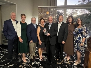 Shining the Light Invitation creative - a jar of twinkling lights.