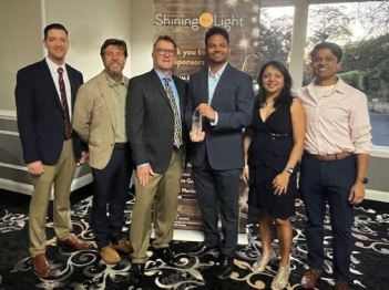 Shining the Light Invitation creative - a jar of twinkling lights.