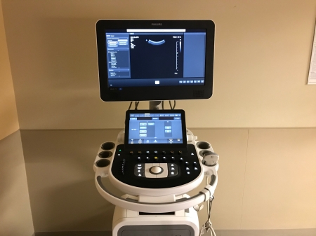 Erik Cohen, MD, shows additional safety tools in place in a treatment room.