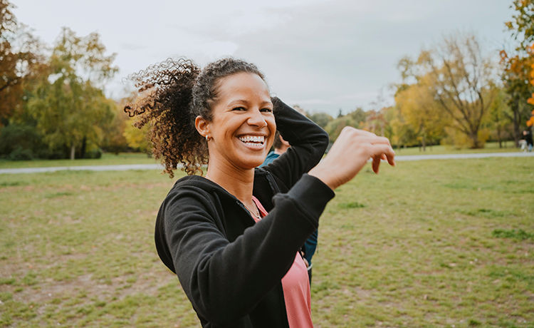 woman smiling on a walk