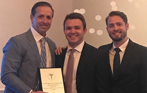 Anthony Spinnicke accepts Attending of the Year Award