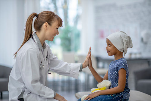 Baby with doctors