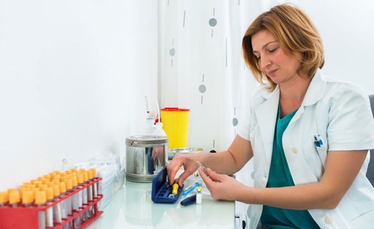 Lab tech prepares vials