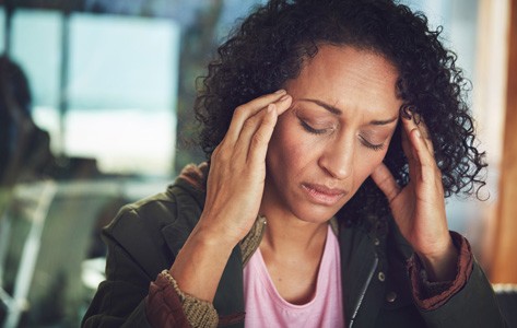 Woman with tension headache