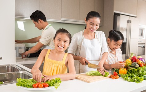 Family cooking nutritious meal