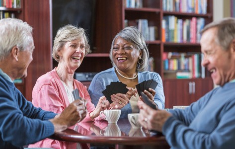 Older adults playing card game