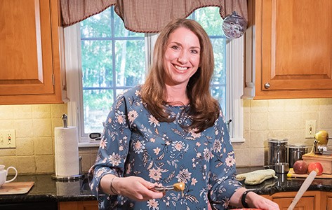 Eileen baking in her kitchen