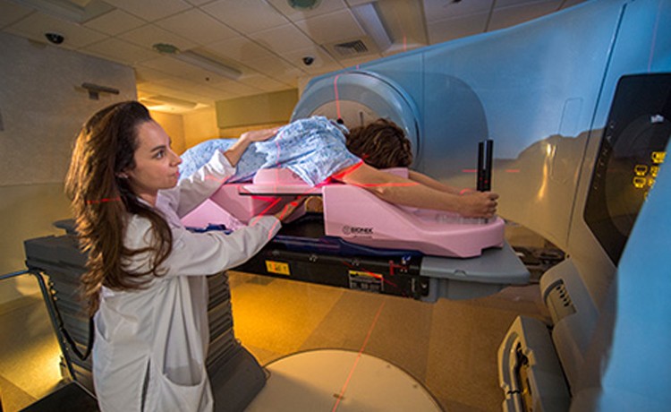 Asian woman getting breast imaging