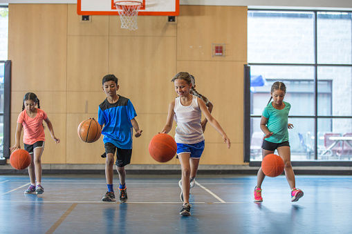 Children playing basketball