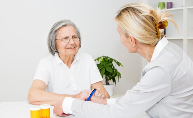 woman talking to clinician