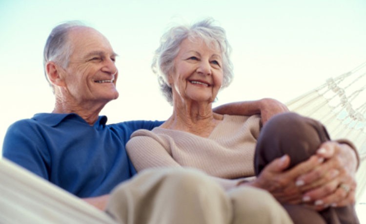 Elder couple in hammock