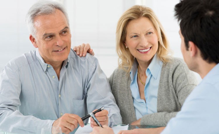 Doctor consults man and woman