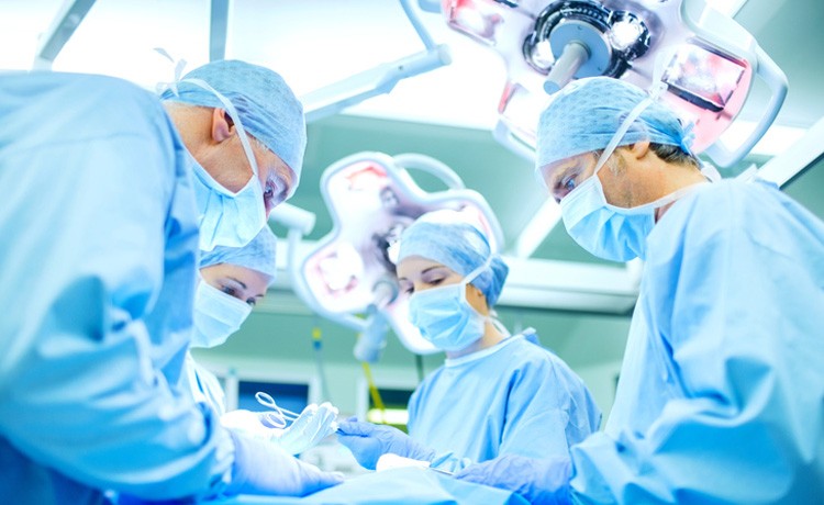 Surgeons operating