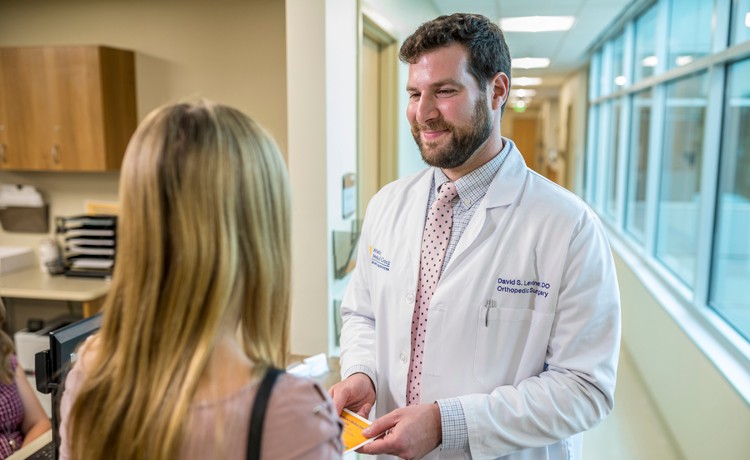 Dr. Levine talking to one of his patients