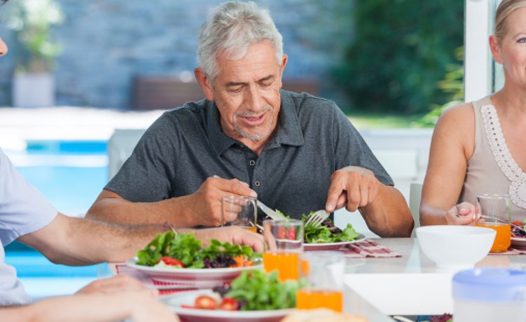 man eating salad