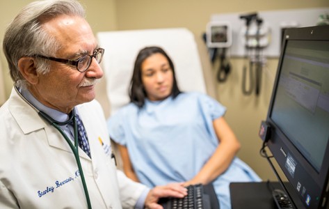 Dr. Bernstein with a patient