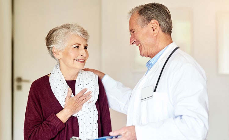 Doctor and patient smiling