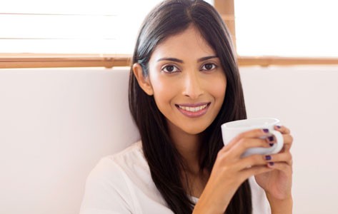 Woman drinking coffee