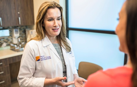 doctor talking to patient