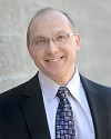 A headshot of Christopher Amato, MD