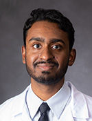 Justin Varughese, MD