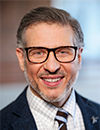 A headshot of Christopher Zipp, DO
