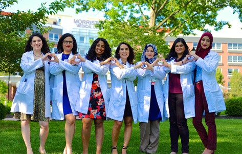 internists posing outside a hospital